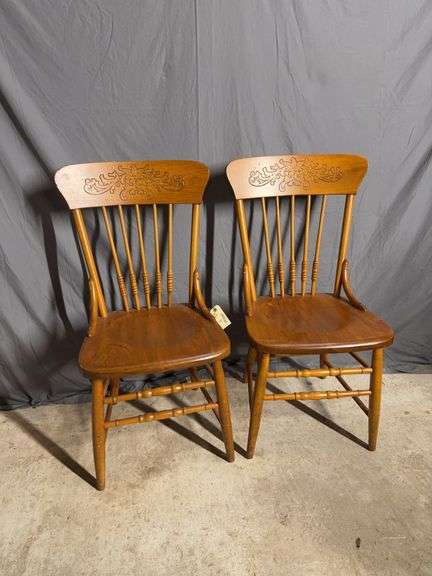 Two matching spindle back dining chairs image