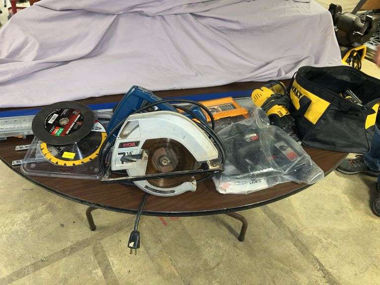 Dewalt 1/2-in hammer drill. Skill jigsaw. Ryobi circular saw. Craftsman pair of saw blade stabilizers, 7- 1/4 in. DeWalt saw blade. Bora Portamate 54-in and 51-in extension. DeWalt 12V lithium drill with charger and battery. image