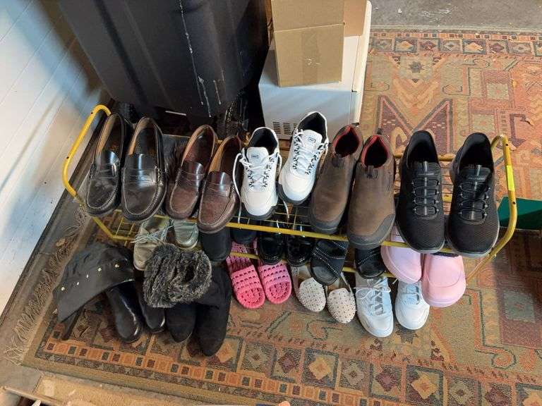 Shoe rack w men’s and women’s shoes Look like men’s size 11 and women’s 7.5 image