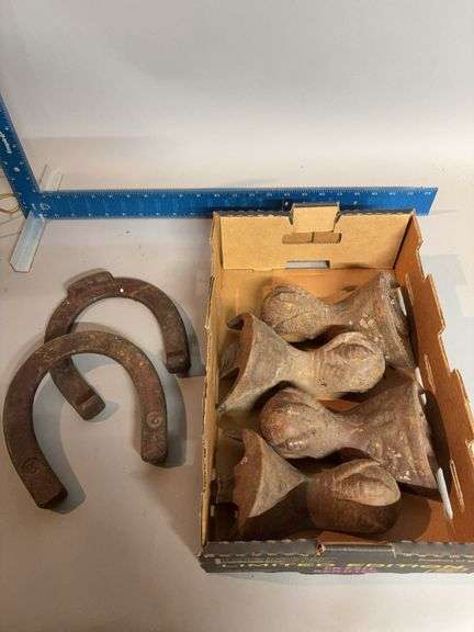 Cast iron claw & ball tub feet and two #2 horseshoes image