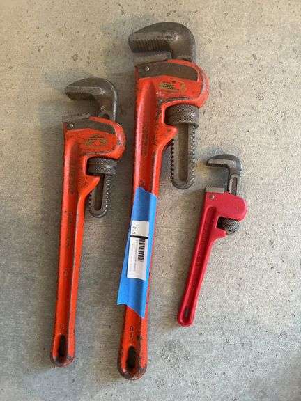 Three pipe wrenches