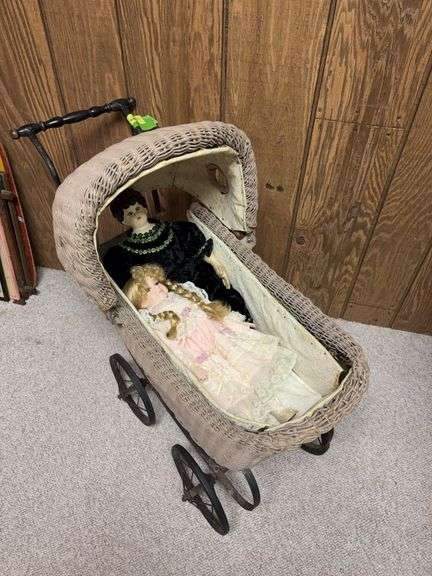 Doll buggy with two dolls image