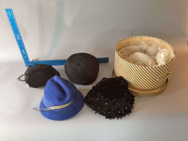Four women’s hats and hat box image