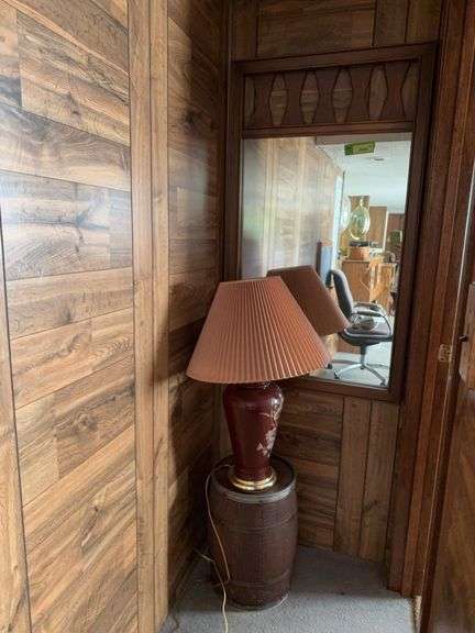 Lamp, nail keg and mirror image