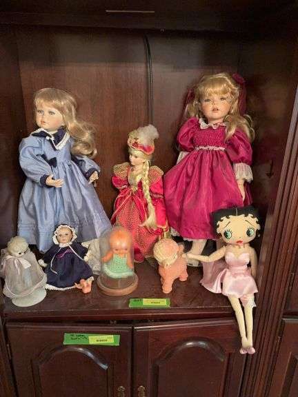 Bisque collector dolls with cloth bodies of all sizes, squeaky rubber sheep and cloth Betty Boop Two tall dolls are Marie Osmond dolls image