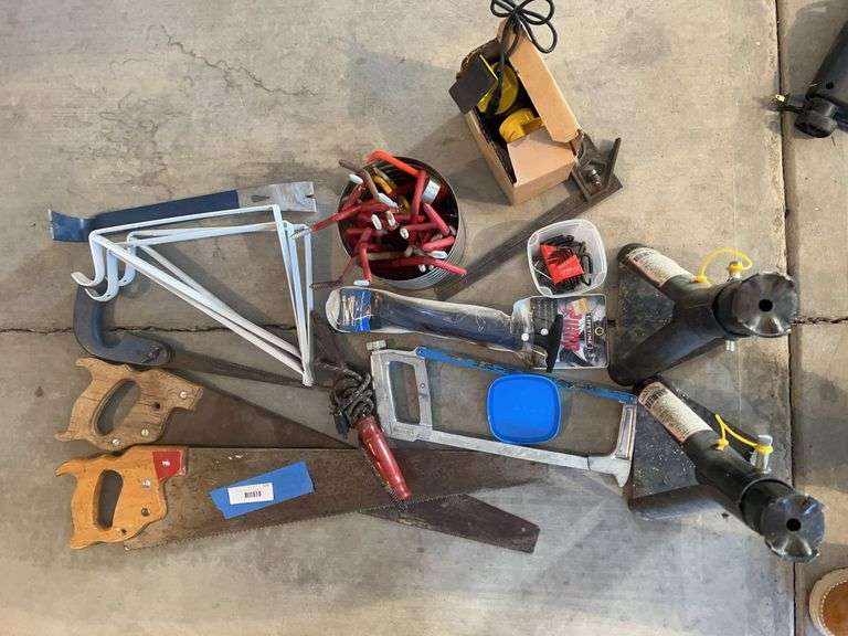 Trailer leveler stands, miscellaneous brackets, nail puller, saws