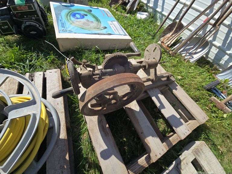 Old hand crank drill press