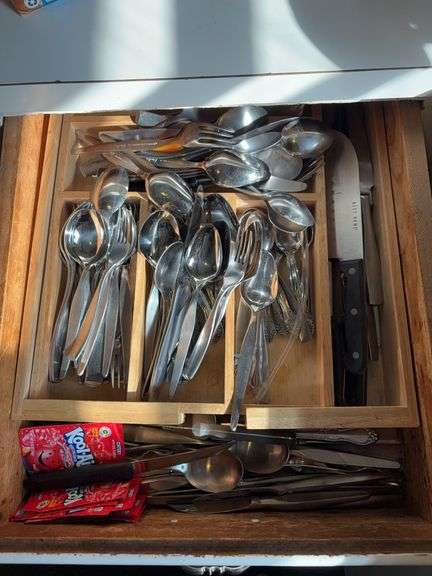 Kitchen drawer FULL of flatware image