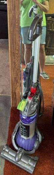 Dyson DC24 upright vac, wall mirror image