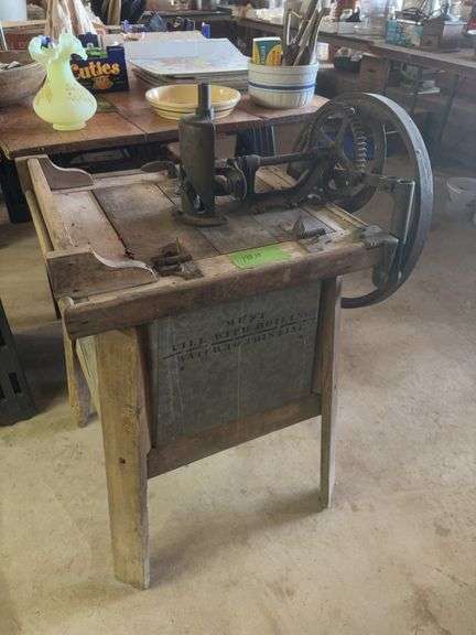 Unmarked washing machine, wood and galvanized base image