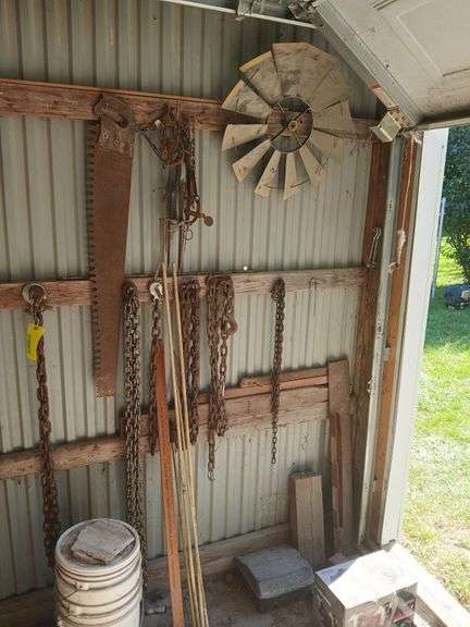 Log chains, traps, mini windmill fan, crosscut saw