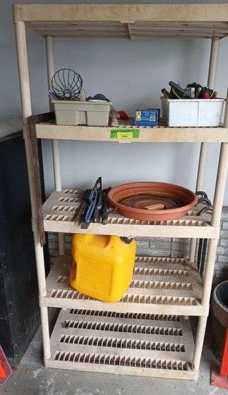 Shelf and content includes files, antique nail puller, diesel can etc... image
