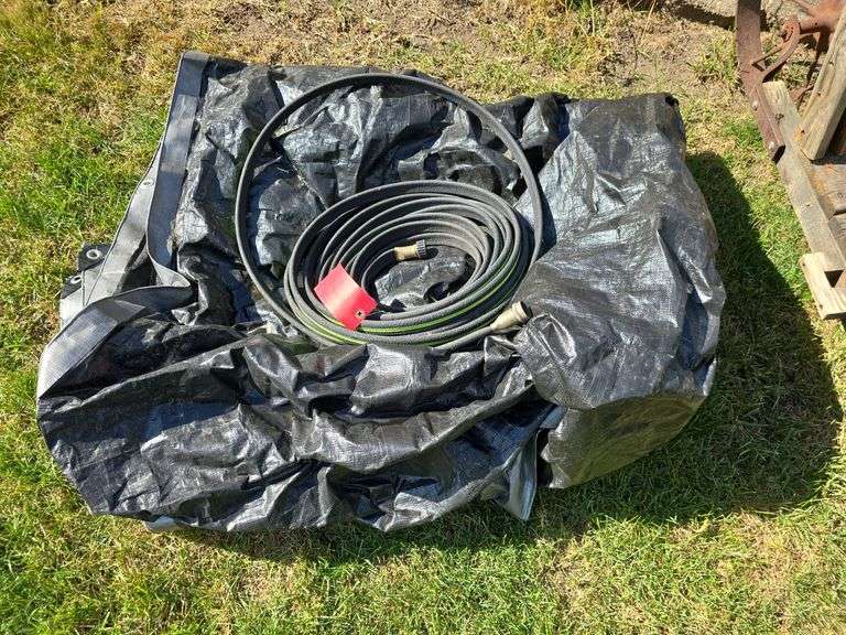 Soaker hose and tarp image