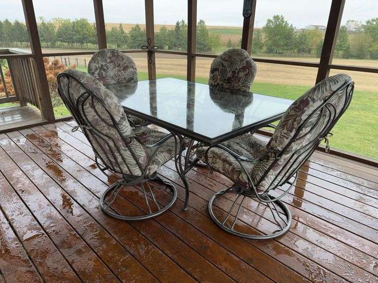 Homecrest 42x62 glass topped patio table w 4 swivel chairs image