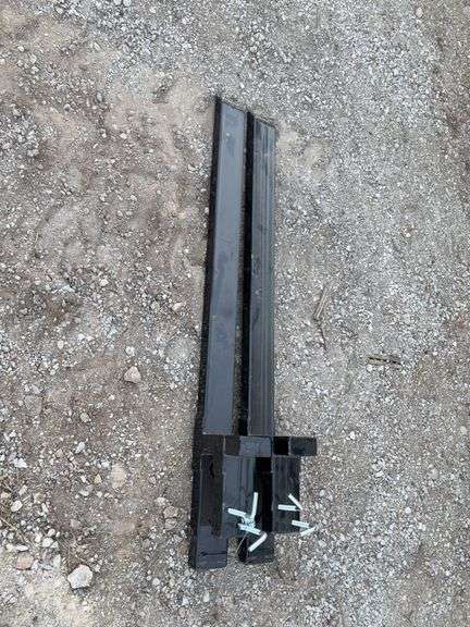 Non-adjustable clip-on pallet fork	WOLVERINE TF2-66-4000G	"Applicable products include tractor accessories, skid steer loaders, and loader buckets Scope of application: Transport logs, timber, and firewood, and move fence posts, hay bales, clear debris, and shrubs Right angle bolt size： (M12x1.75) × 150mm Hexagonal flange with gasket flower tooth flange nut： M12x1.75" image