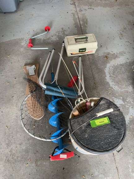 Ice auger, fillet board, tackle box, fishing stool and ice fishing poles image