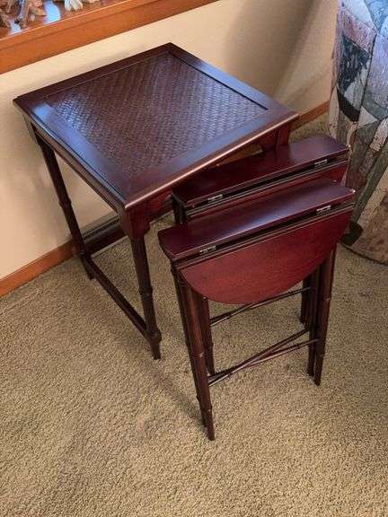 Square table hiding two round ones image