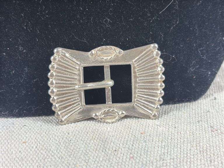 Small unmarked cast buckle 2 1/4 by 1.5 “ 19 grams image