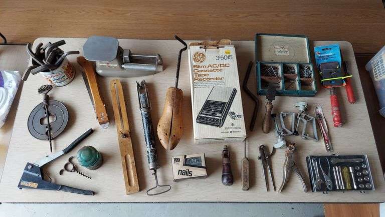 Misc items, electrical tools, postal scale, ice skate bottoms, binoculars, 2 portable cassette tape players, kettle, etc. image