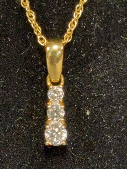 Women’s 18” chain marked 14K XL, pendant marked 14K HDS with graduating diamond trio pendant image