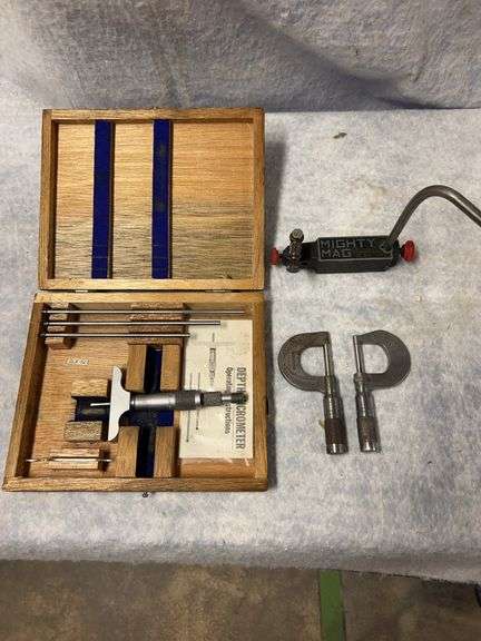 Nsk inside micrometer with four rods and wrench, two brown and sharp 1-in micrometers in fabric pouch, Mighty Mag mount for dial indicators. image