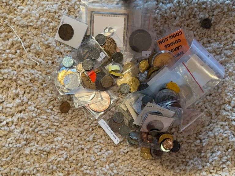 Box of Foreign and Domestic coins, unsorted image