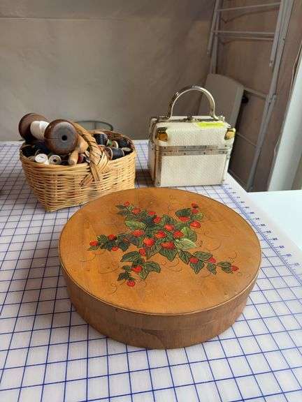 Basket of spools, small hinge lid box and round wood box image