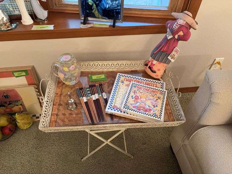 Metal serving style tray on legs with Mary Engelbright items, chopsticks, bedside water pitcher and bell image