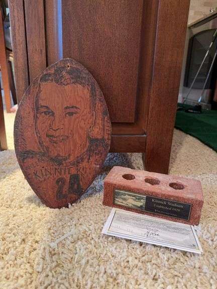 Kinnick Stadium brick and hand wood burned football shaped Nile Kinnick board image
