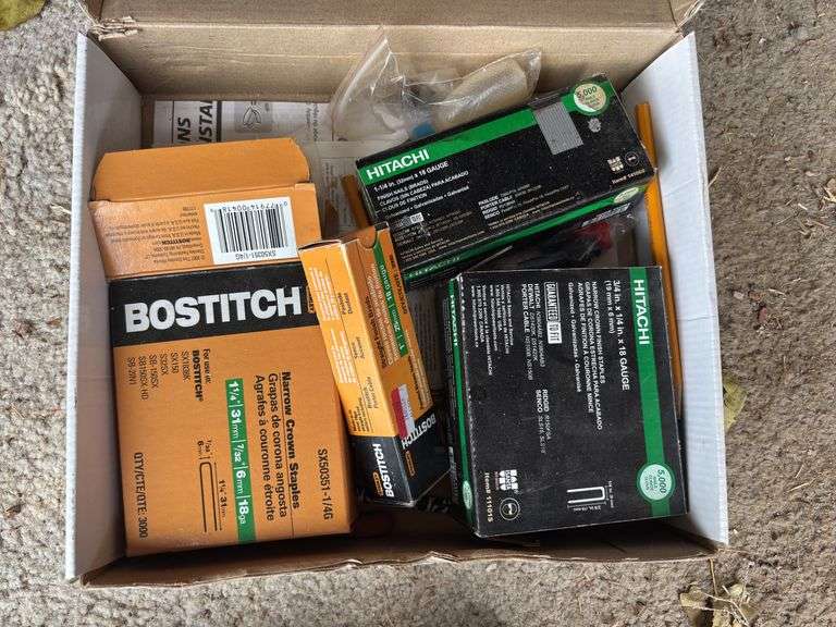 Nearly full box of narrow crown staples plus full boxes of nails and staples image