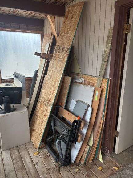 Black & Decker workmate 300 and assortment of lumber and plywood image