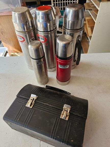 Lunch boxes and thermoses and a time clock to make sure you don't take a LONG break!! image