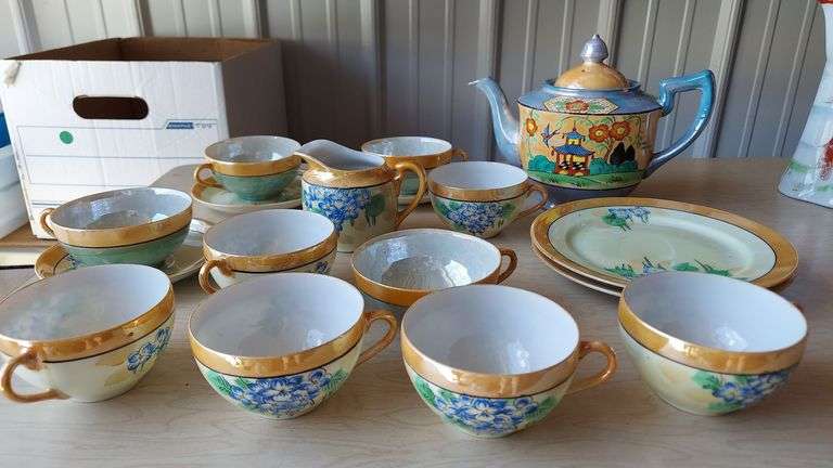 China and glassware includes Order of the Eastern Star, Asian influence, Shawnee duck pitcher, floral pattern, beer steins, etc image