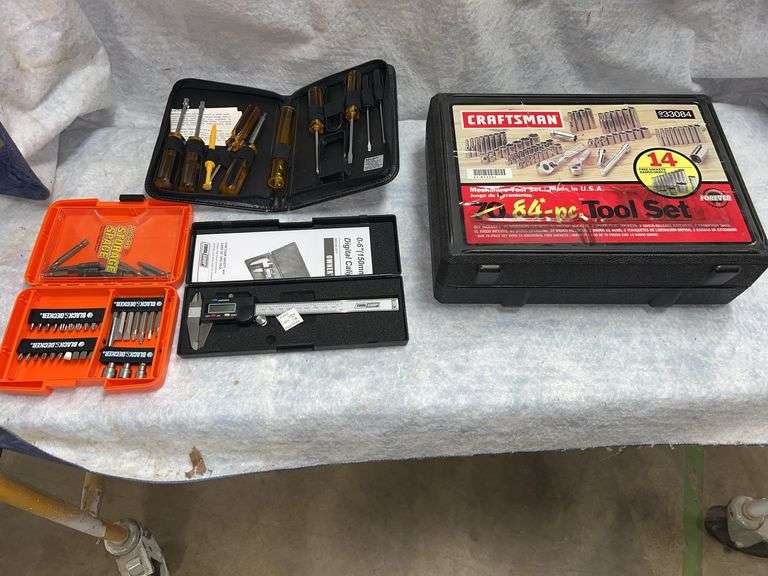 Craftsman 84-piece tool set includes SA and SAE and metric 1/4 in and  3/8 in sockets, ratchets,  and extensions. No missing tools. Radio shack screwdriver set, Black& Decker driver bit set, ToolShop digital caliper. image