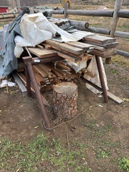 Lumber pile and heavy duty saw horses image
