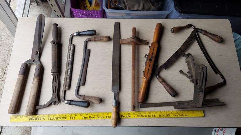 Various large hand tools, vintage and antique, auger bits, pipe wrenches, woodworking image