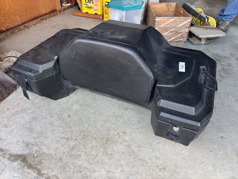 Black plastic four wheeler storage case with padded seat back image