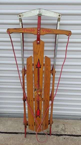 Vintage Flexible Flyer model F055 wood & metal rail SLED, Christmas Decoration Winter Decor. Model# stamped on underside, Wood construction with metal rails. Dimensions: 54.5"L x 6"H x 13.5"W, Steering Rail is 22"W. VERY GOOD vintage condition! No major damage, all parts intact and functional. image