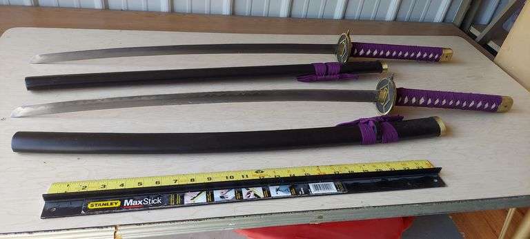 Two samurai swords (costume/decorative) image