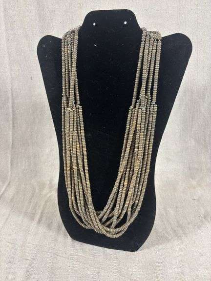 Multi strand brown/green beaded necklace strung on cord image