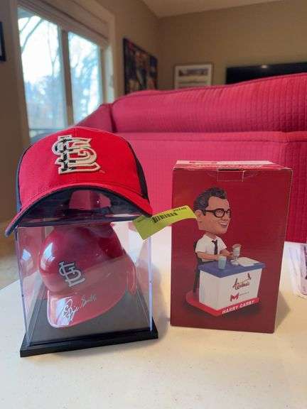 Harry Caray bobblehead, ball cap, and Ozzie Smith mini helmet image