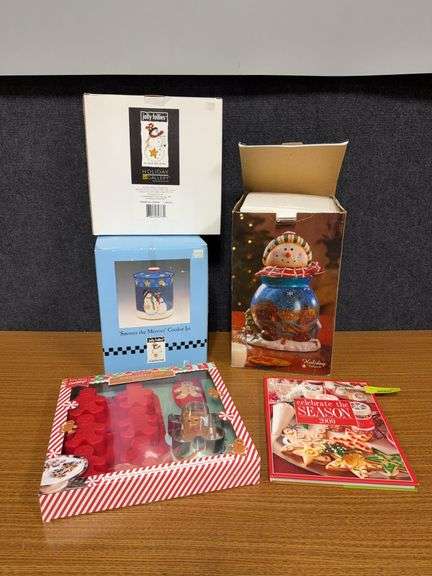 Jolly Follies cookie jar w matching cookie plate, gingerbread man baking set, snowman cookie jar and BH&G Celebrate the Season 2009 book image