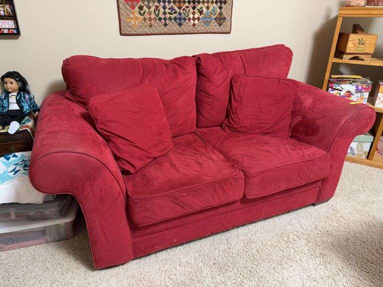 Red Sofa Express loveseat 72" shows wear image