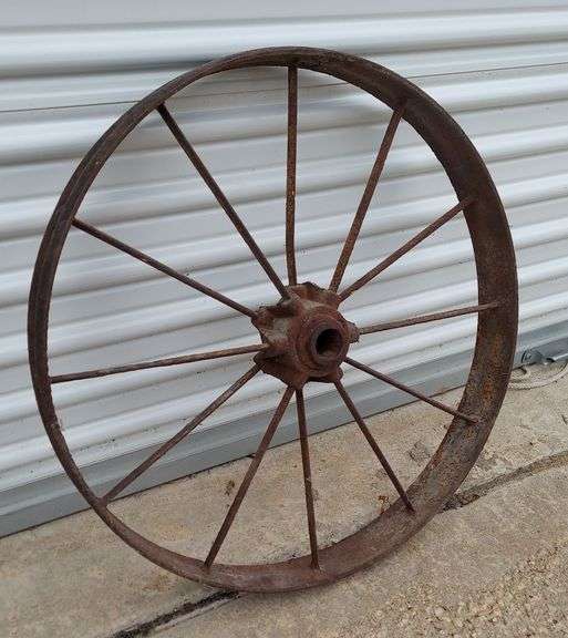 3 Antique Buggy Steel Wheels: (1) 26"dia. wheel with 3"W track; (2) 30"dia. wheels with 2"W tracks; all in standard antique condition, rust patina, intact with no major damage. (seller ID#s 630-01, 630-03, 630-04) image