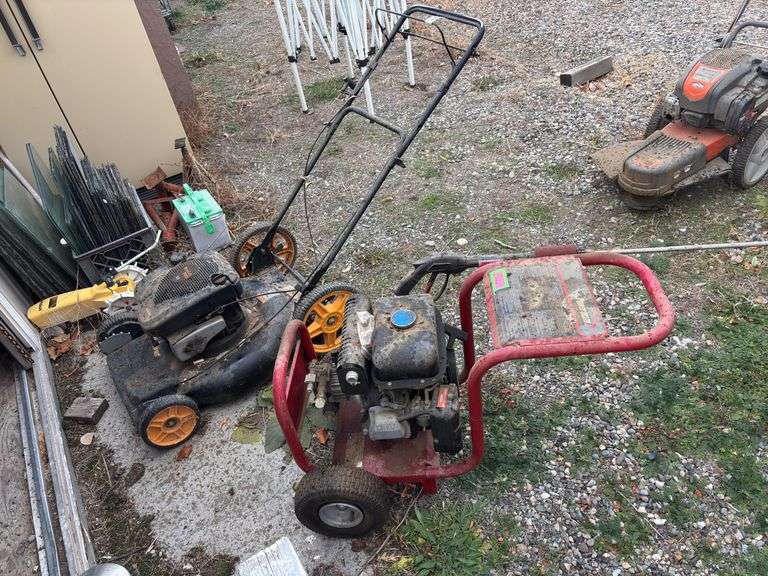 Two push mowers and pressure washer in unknown condition image