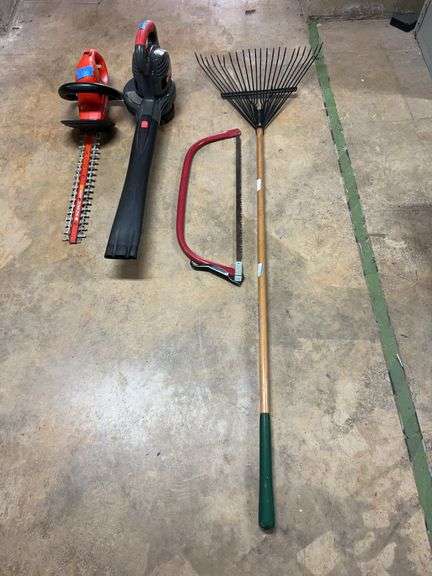 Scott's Turf Builder Edgeguard broadcast spreader, rake, Great States real mower, 17-in cut. Craftsman 220 MPH leaf blower, Black& Decker hedge trimmer 18-in cut. image