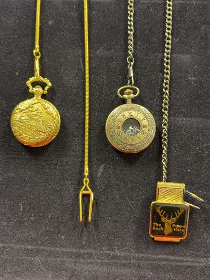Two pocket watches and a money clip image