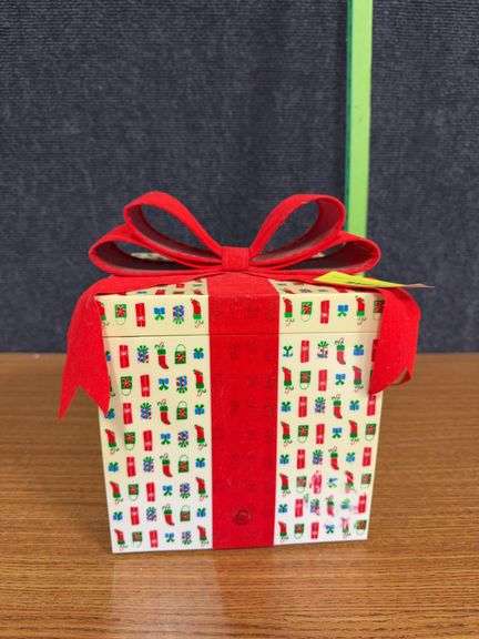 Winnie the Pooh present, lid lifts to reveal Pooh and friends ice skating image