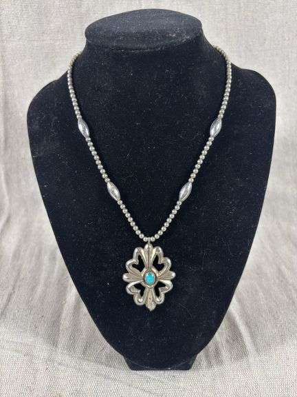 Unmarked vintage cast with turquoise pendant  and navajo pearls 23 g total weight image