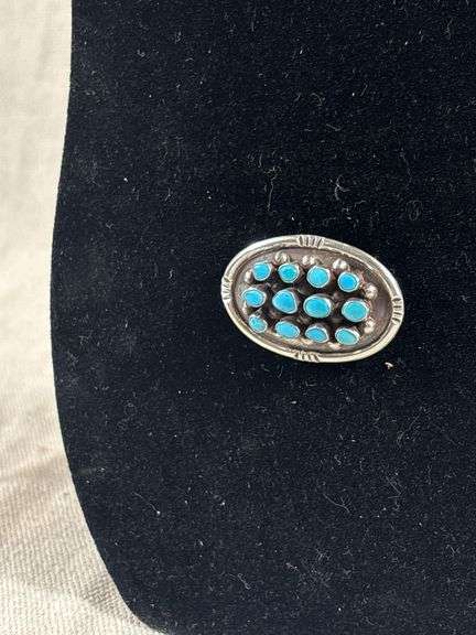 Unmarked vintage oval brooch with 12 turquoise stones, 11 g total weight 1.75” x 1” image